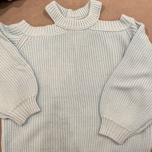 Women’s cold shoulder sweater.